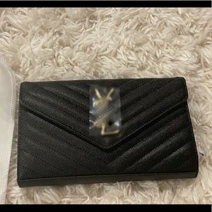 Wallet on chain caviar black bag , gold hardware . Very good quality